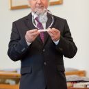 Andrzej Łapa holding Medal of Henryk Wieniawski Musical Society of Poznań  / RR Studio