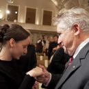 Agata Szymczewska receives congratulations from Andrzej Wituski 